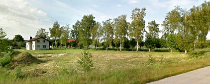 Blick von der Landstraße auf die Häuser von Pempenl